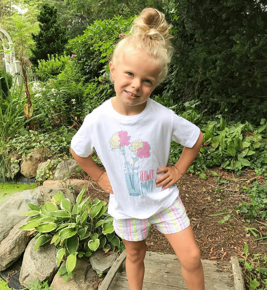 Olivia loves her Lands' End Love Learning graphic tee. 