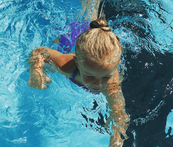 A still from the cutest video ever - my daughter learning to swim!