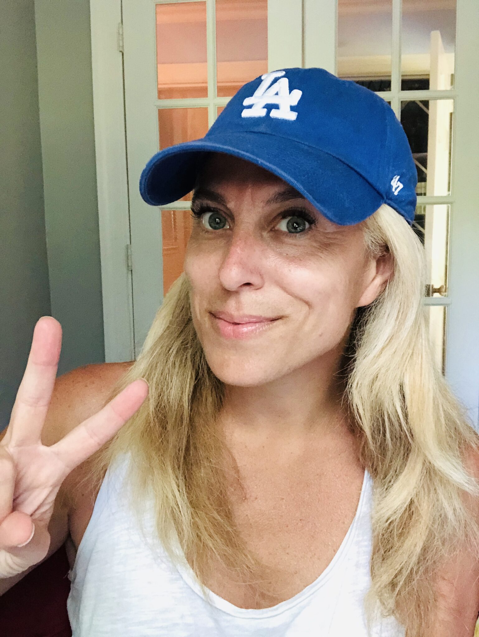 How To Wear A Baseball Hat With Long Hair Stylish Life For Moms
