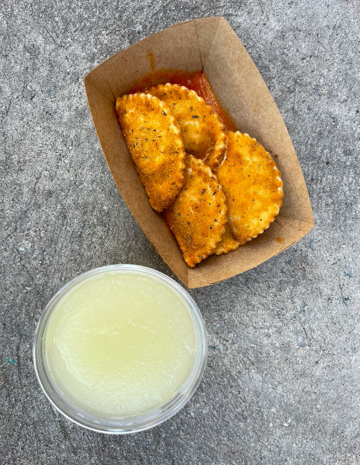 Mezzelune Croccanti: Crispy Half-moon Breaded Mozzarella-filled Ravioli with Pomodoro Sauce