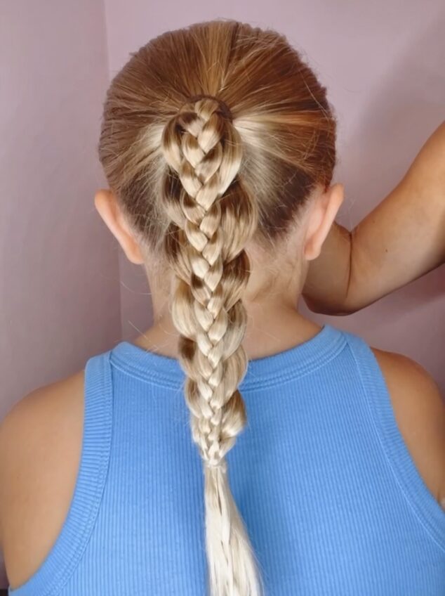 Young girl shows her stylish hair before school dance Stock Photo - Alamy